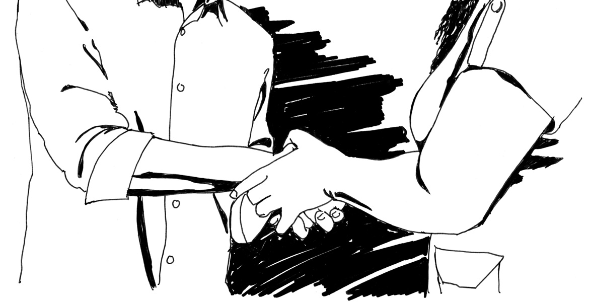 Two people in a handshake